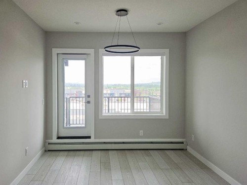 2413-111 Wolf Creek Drive Se, Calgary, AB - Indoor Photo Showing Other Room