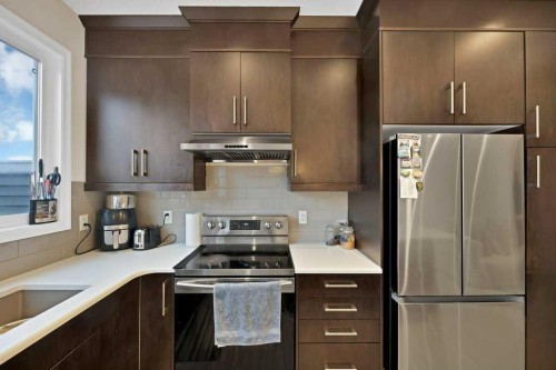 122 Kingfisher Crescent Se, Airdrie, AB - Indoor Photo Showing Kitchen With Stainless Steel Kitchen
