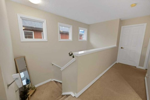 122 Kingfisher Crescent Se, Airdrie, AB - Indoor Photo Showing Other Room