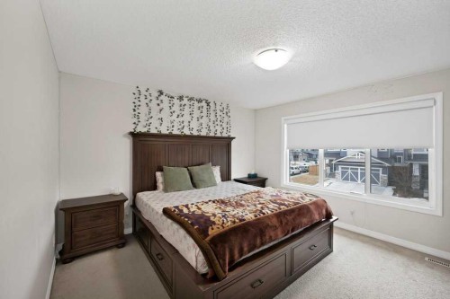 122 Kingfisher Crescent Se, Airdrie, AB - Indoor Photo Showing Bedroom