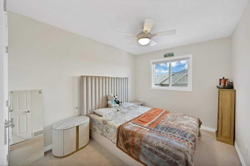 122 Kingfisher Crescent Se, Airdrie, AB - Indoor Photo Showing Bedroom