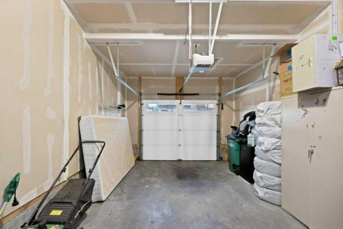 122 Kingfisher Crescent Se, Airdrie, AB - Indoor Photo Showing Garage