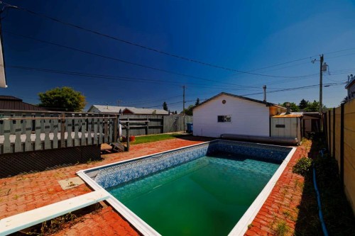 3236 Doverville Crescent Se, Calgary, AB - Outdoor With In Ground Pool