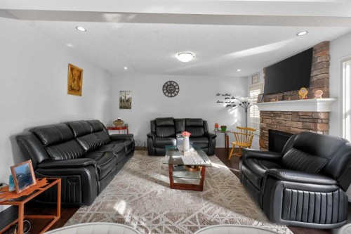 15 Cityscape Mews Ne, Calgary, AB - Indoor Photo Showing Living Room With Fireplace