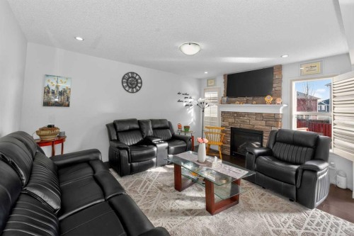 15 Cityscape Mews Ne, Calgary, AB - Indoor Photo Showing Living Room With Fireplace