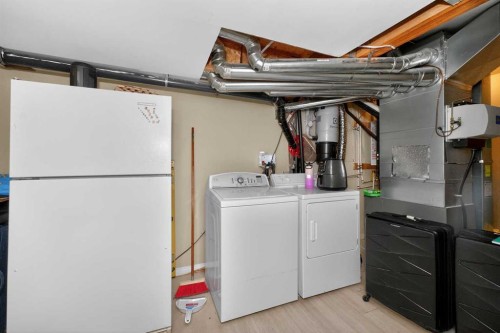 15 Cityscape Mews Ne, Calgary, AB - Indoor Photo Showing Laundry Room