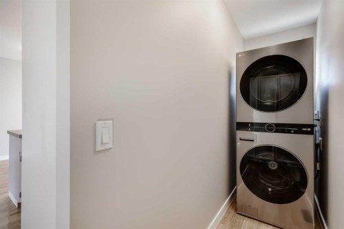 8111 Ranchview Drive Nw, Calgary, AB - Indoor Photo Showing Laundry Room