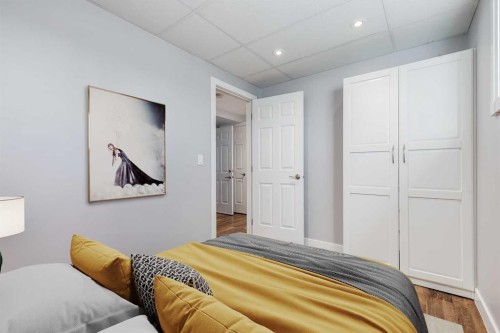 8111 Ranchview Drive Nw, Calgary, AB - Indoor Photo Showing Bedroom