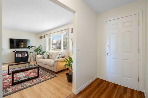 308 Hunterbrook Place Nw, Calgary, AB - Indoor Photo Showing Living Room
