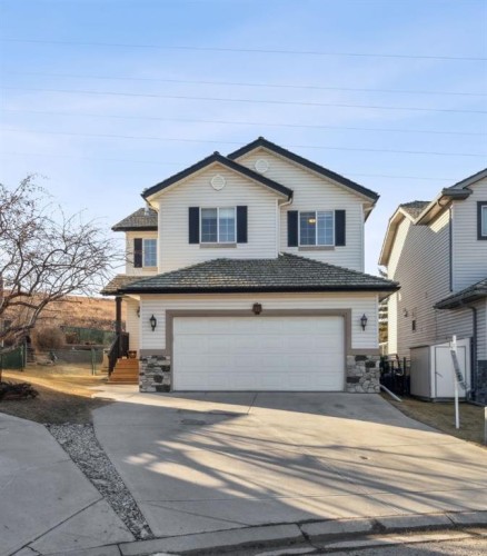 104 Bow Ridge Crescent, Cochrane, AB - Outdoor With Facade