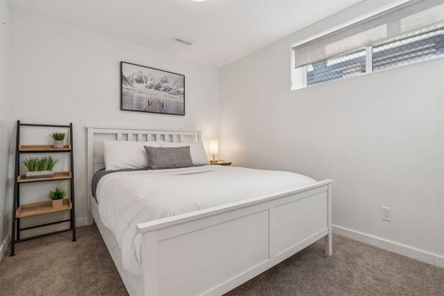 104 Bow Ridge Crescent, Cochrane, AB - Indoor Photo Showing Bedroom