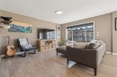 104 Bow Ridge Crescent, Cochrane, AB  - Indoor Photo Showing Living Room 