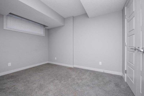 226 Redstone Drive Ne, Calgary, AB - Indoor Photo Showing Other Room