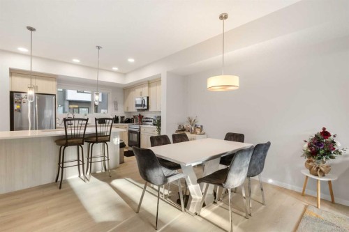 405-20295 Seton Way Se, Calgary, AB - Indoor Photo Showing Dining Room