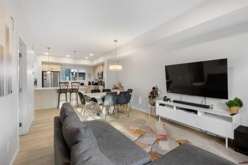 405-20295 Seton Way Se, Calgary, AB - Indoor Photo Showing Living Room