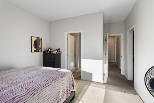 405-20295 Seton Way Se, Calgary, AB - Indoor Photo Showing Bedroom