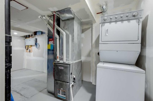 116 Deer Run Close Se, Calgary, AB - Indoor Photo Showing Laundry Room