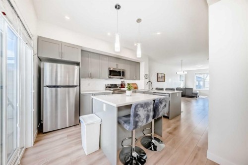 240 Copperleaf Way Se, Calgary, AB - Indoor Photo Showing Kitchen With Upgraded Kitchen