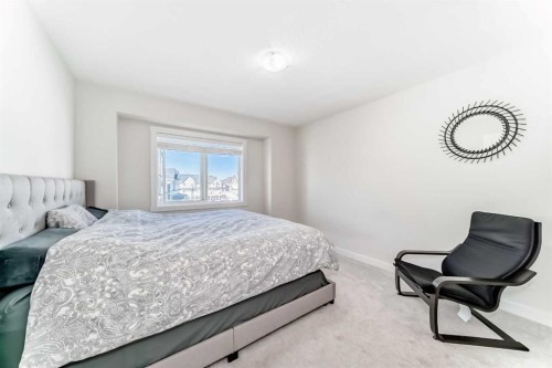 240 Copperleaf Way Se, Calgary, AB - Indoor Photo Showing Bedroom