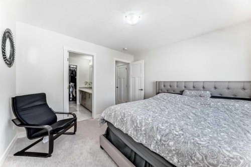 240 Copperleaf Way Se, Calgary, AB - Indoor Photo Showing Bedroom