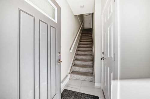 240 Copperleaf Way Se, Calgary, AB - Indoor Photo Showing Other Room