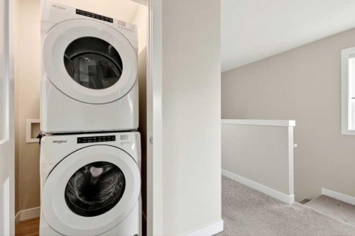 168 Crestridge Common Sw, Calgary, AB - Indoor Photo Showing Laundry Room