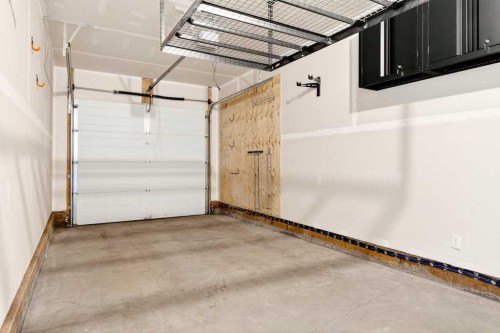 168 Crestridge Common Sw, Calgary, AB - Indoor Photo Showing Garage