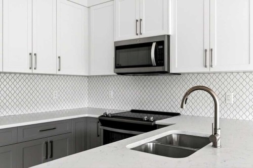 168 Crestridge Common Sw, Calgary, AB - Indoor Photo Showing Kitchen With Double Sink