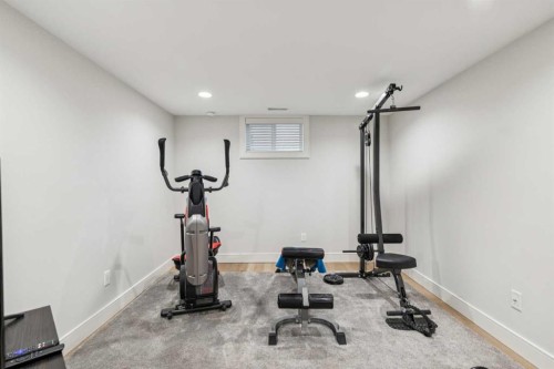 412 Athlone Road Se, Calgary, AB - Indoor Photo Showing Gym Room