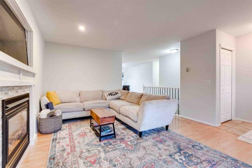 307 Regal Crescent, Trochu, AB - Indoor Photo Showing Living Room With Fireplace