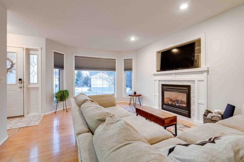 307 Regal Crescent, Trochu, AB - Indoor Photo Showing Living Room With Fireplace