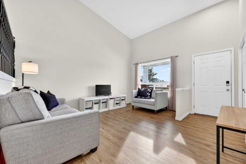 250 Cimarron Boulevard, Okotoks, AB - Indoor Photo Showing Living Room