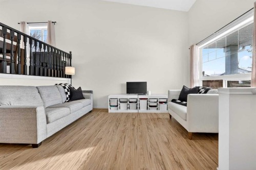250 Cimarron Boulevard, Okotoks, AB - Indoor Photo Showing Living Room