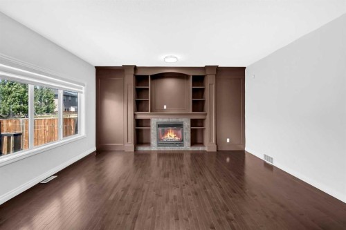 422 Taralake Way Ne, Calgary, AB - Indoor Photo Showing Other Room With Fireplace