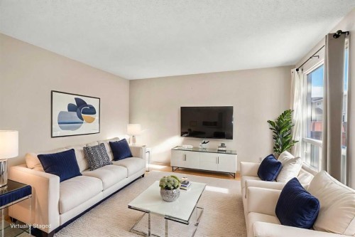 93-1155 Falconridge Drive Ne, Calgary, AB - Indoor Photo Showing Living Room