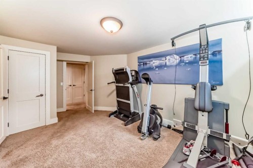 36 Dalrymple Green Nw, Calgary, AB - Indoor Photo Showing Gym Room