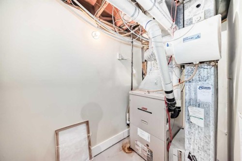 36 Dalrymple Green Nw, Calgary, AB - Indoor Photo Showing Basement