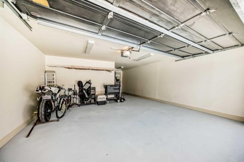 36 Dalrymple Green Nw, Calgary, AB - Indoor Photo Showing Garage