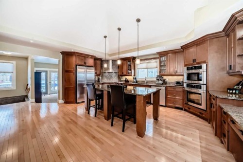 36 Dalrymple Green Nw, Calgary, AB - Indoor Photo Showing Kitchen With Upgraded Kitchen