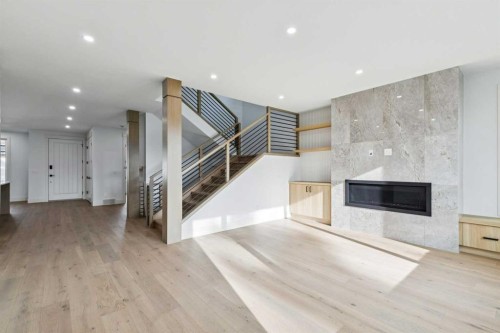 1835 Braemar Place Sw, Calgary, AB - Indoor Photo Showing Living Room With Fireplace