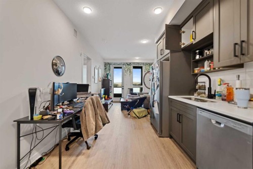 310-3932 University Avenue Nw, Calgary, AB - Indoor Photo Showing Kitchen With Double Sink