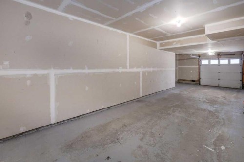 68 Evansview Road Nw, Calgary, AB - Indoor Photo Showing Garage