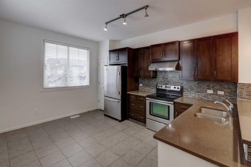 68 Evansview Road Nw, Calgary, AB - Indoor Photo Showing Kitchen With Stainless Steel Kitchen With Double Sink