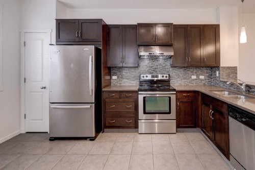68 Evansview Road Nw, Calgary, AB - Indoor Photo Showing Kitchen With Stainless Steel Kitchen With Double Sink
