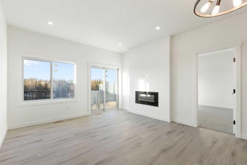 25 St. Andrews Close, Lyalta, AB - Indoor With Fireplace
