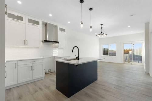 25 St. Andrews Close, Lyalta, AB - Indoor Photo Showing Kitchen With Upgraded Kitchen