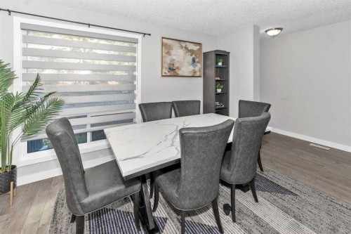 151-6915 Ranchview Drive Nw, Calgary, AB - Indoor Photo Showing Dining Room