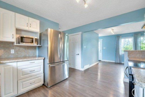 8319 Bowness Road, Calgary, AB - Indoor Photo Showing Kitchen