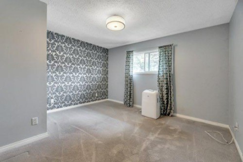 8319 Bowness Road, Calgary, AB - Indoor Photo Showing Other Room