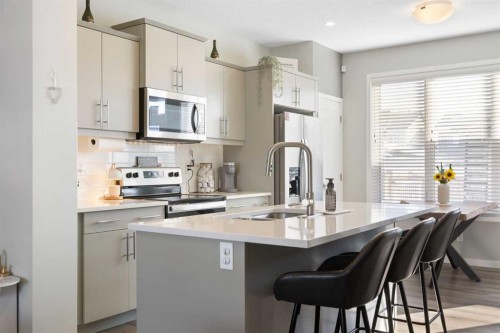 277 Ellen Way, Crossfield, AB - Indoor Photo Showing Kitchen With Upgraded Kitchen